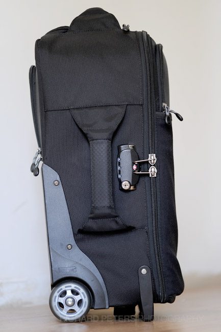 The left side of the bag houses a nice thick padded handle and the main compartments lock.
