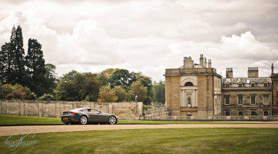 The Aston Martin was our dream wedding car An Aston Martin, parked outside Woburn Abbey. Guy Collier wedding photography
