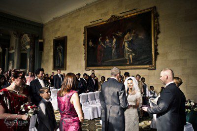 Exchanging vows in the stunning Sculpture Gallery at Woburn Abbey. Guy Collier wedding photography